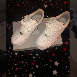 Women’s white Air Force 1s. Does not come with original box.